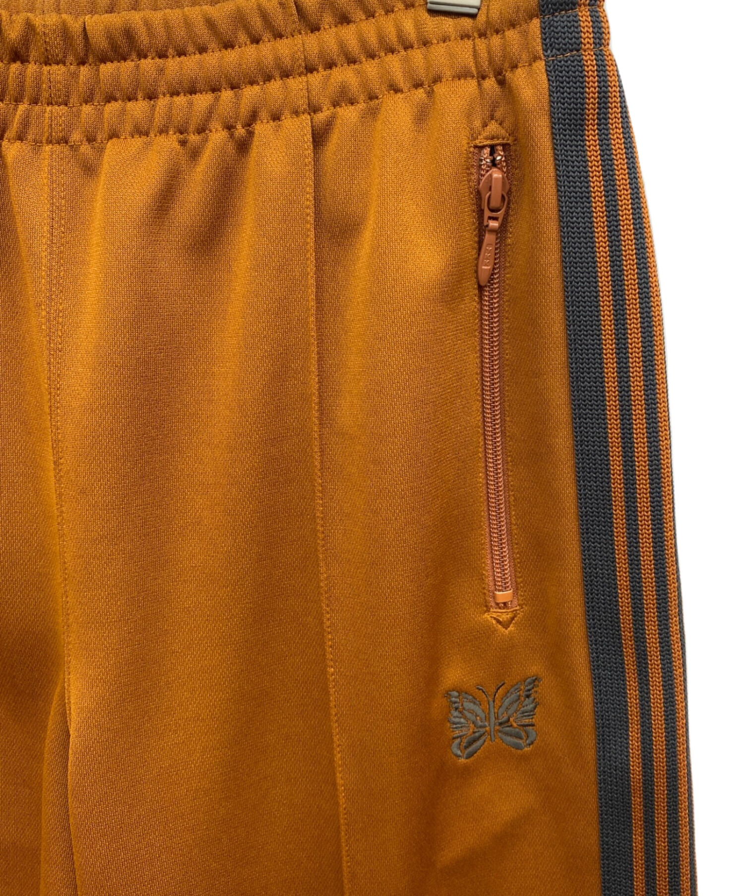 中古・古着通販】Needles (ニードルズ) BOOTCUT TRACK PANT オレンジ 