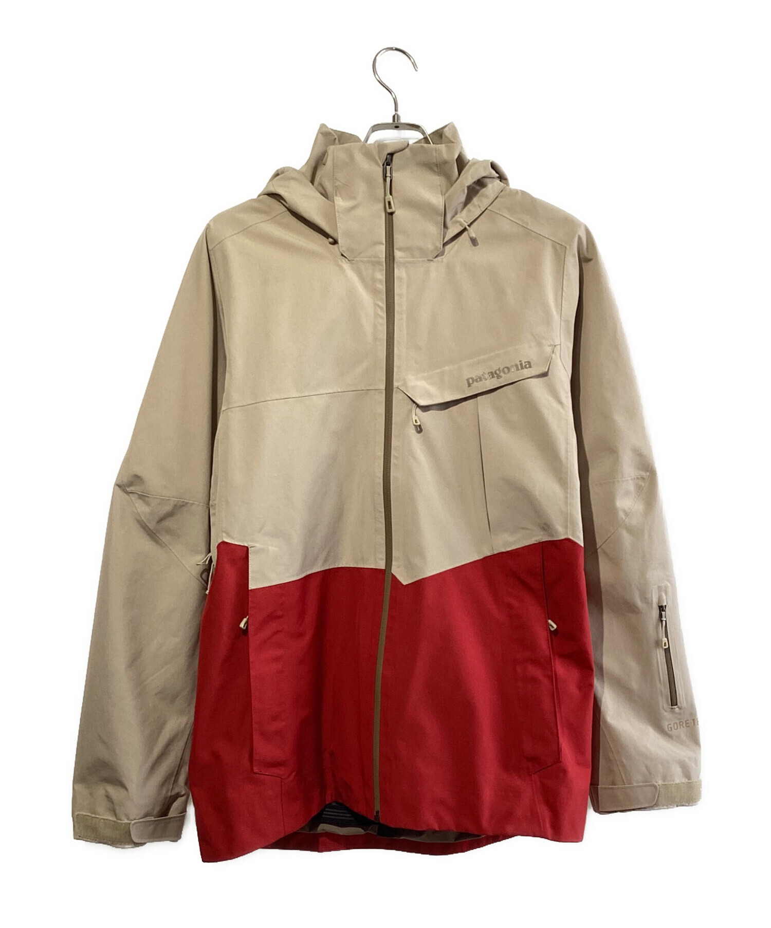patagonia フード付きジャケット ベージュ 袋付き】Patagonia ベージュ フード付き 中綿ブルゾン コート - メルカリ