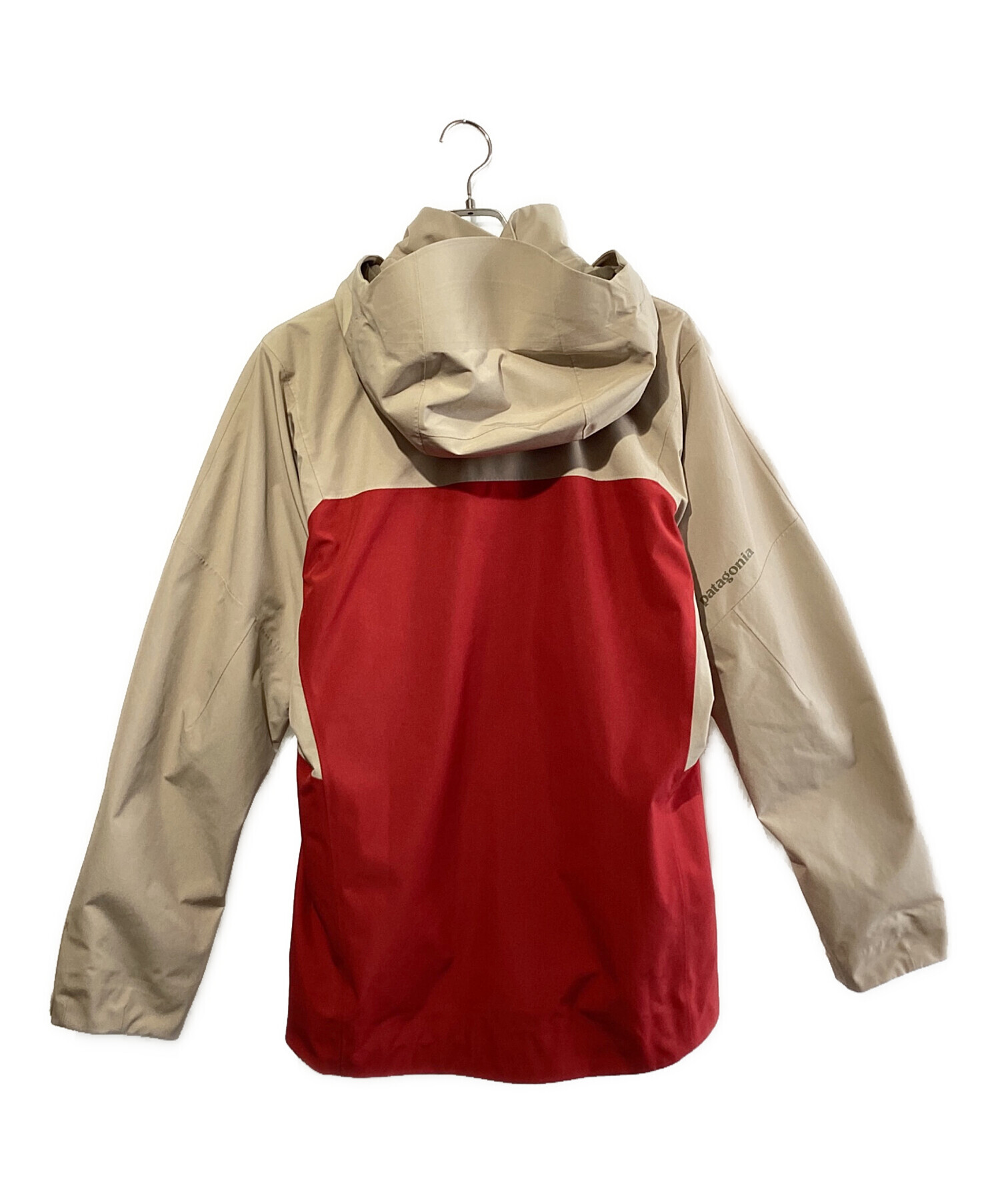 patagonia フード付きジャケット ベージュ 袋付き】Patagonia ベージュ フード付き 中綿ブルゾン コート - メルカリ