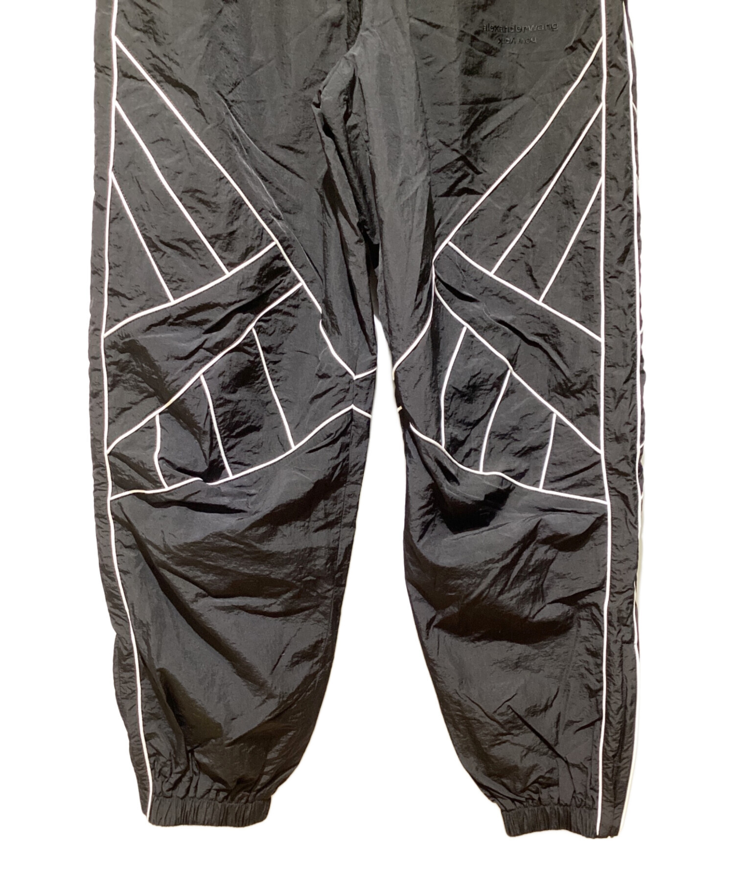 アレキサンダーワン alexander wang レザーパンツ　ロゴウエスト Alexander Wang ロゴウエスト パンツ | ブラック | FARFETCH JP