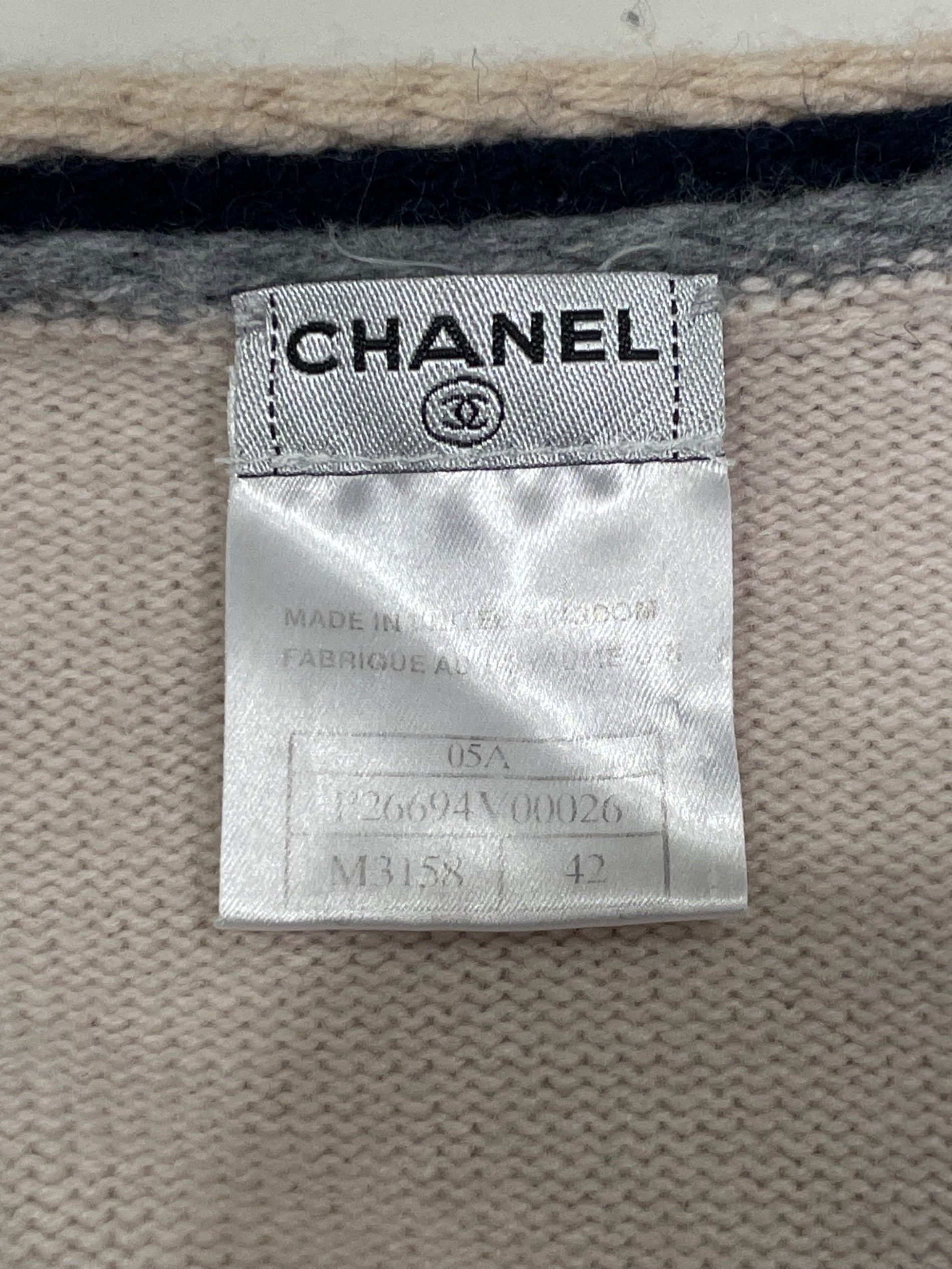 レア CHANEL シャネル 05Aカシミヤ混 42 1226-2 AHC3 中古・古着通販】CHANEL (シャネル) 05A カシミヤ ココマークボタン