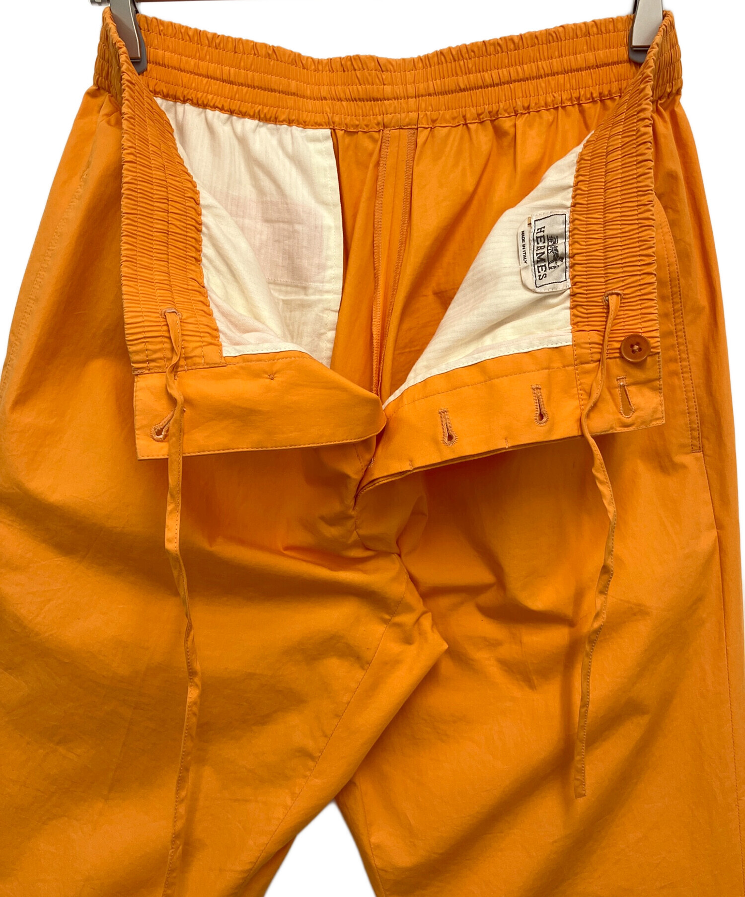 中古・古着通販】HERMES (エルメス) パンツ オレンジ サイズ:44