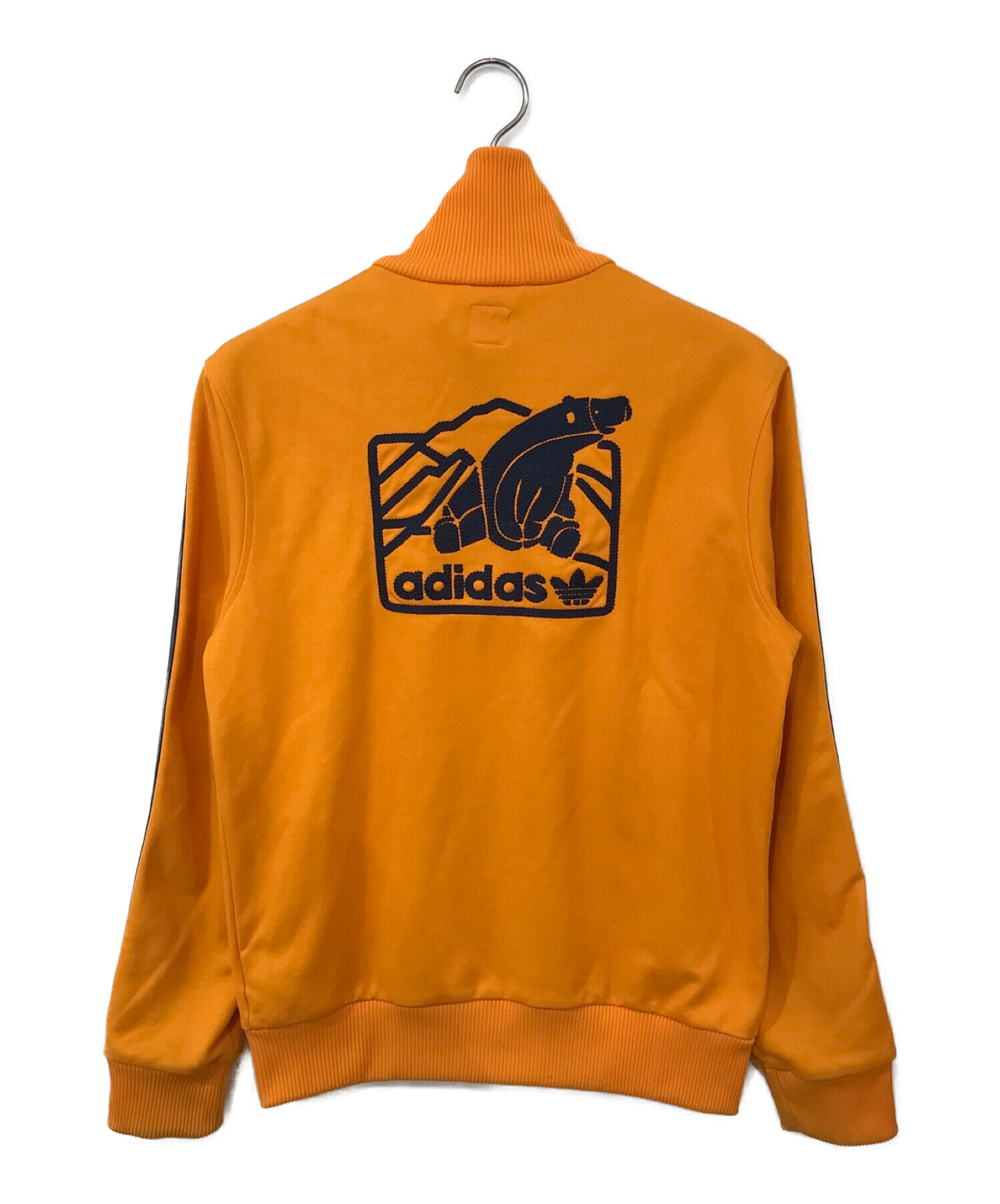 adidas (アディダス) クマ刺繍トラックジャケット オレンジ サイズ:M