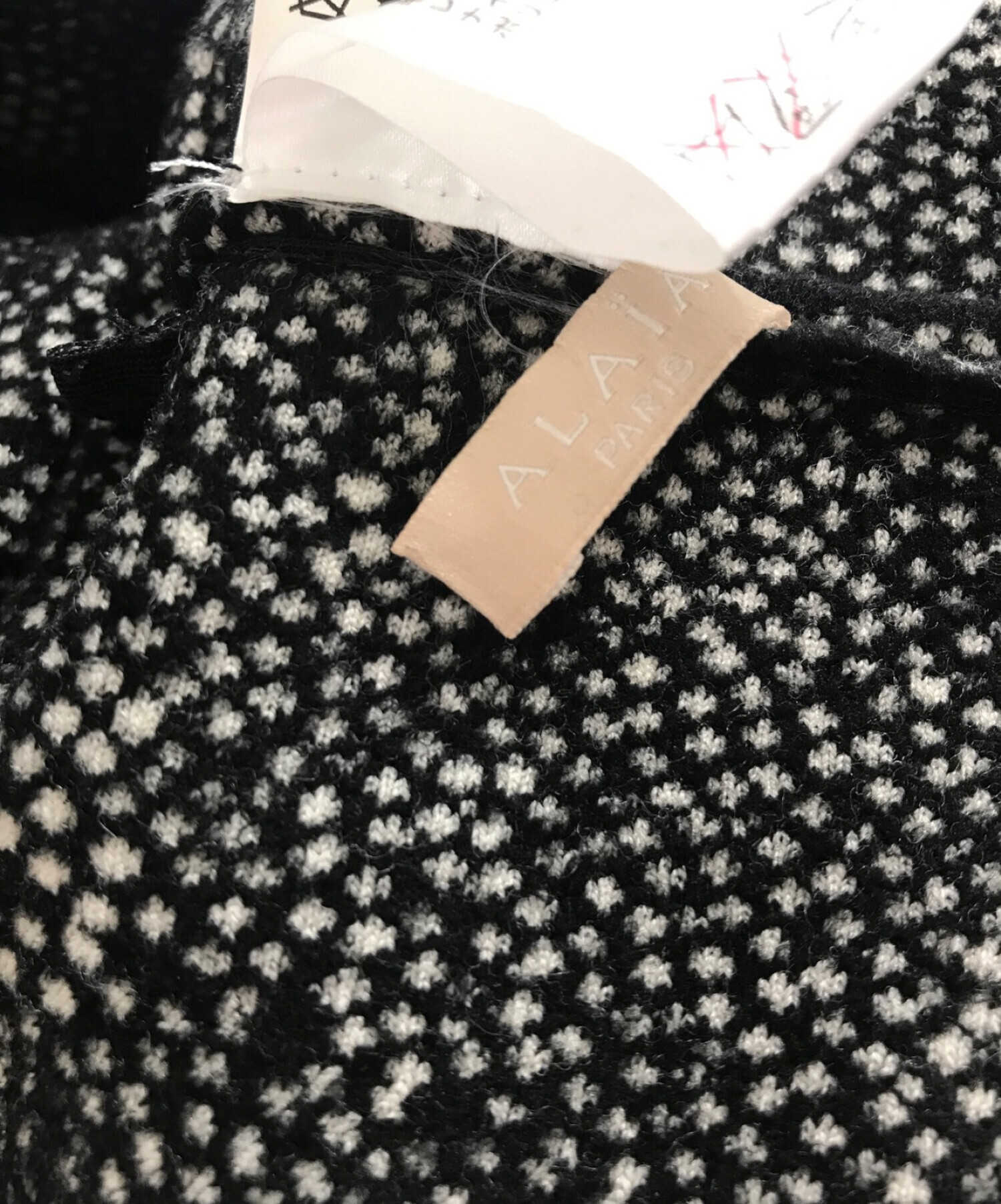 中古・古着通販】ALAIA (アライア) ペプラムスケーターニット ブラック 